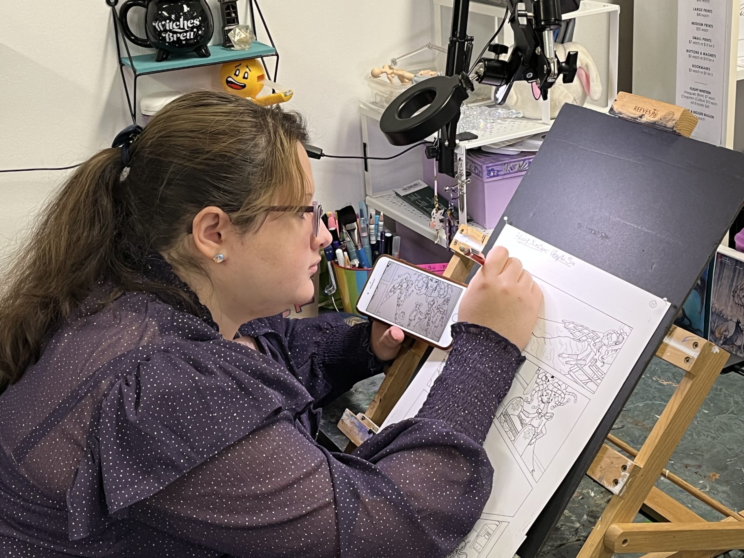 Artist Audra Balion draws on an easel | Learn to draw with Audra in one of her Saskatoon art classes!